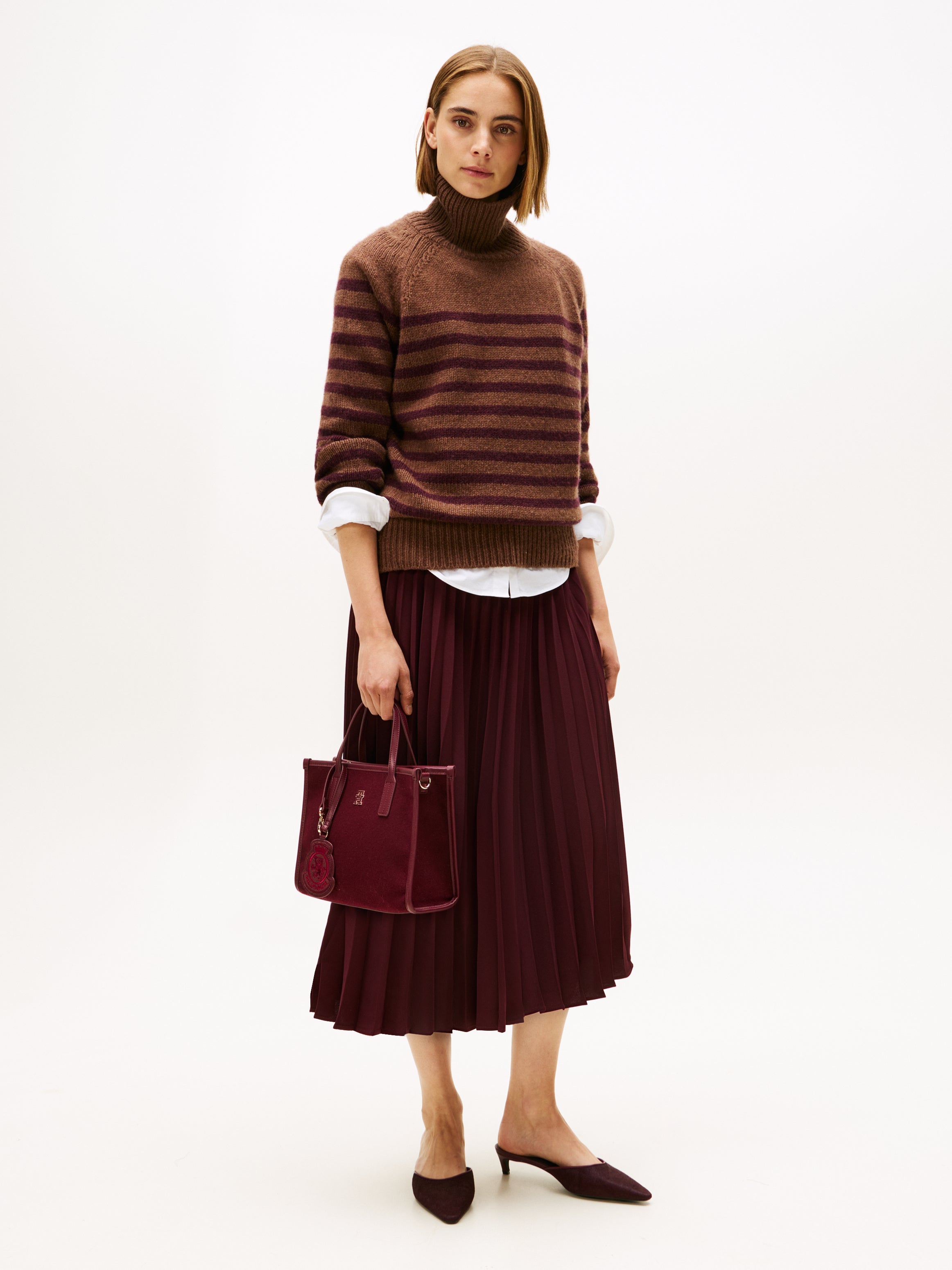 FLUID PLEATED PULL ON MIDI SKIRT