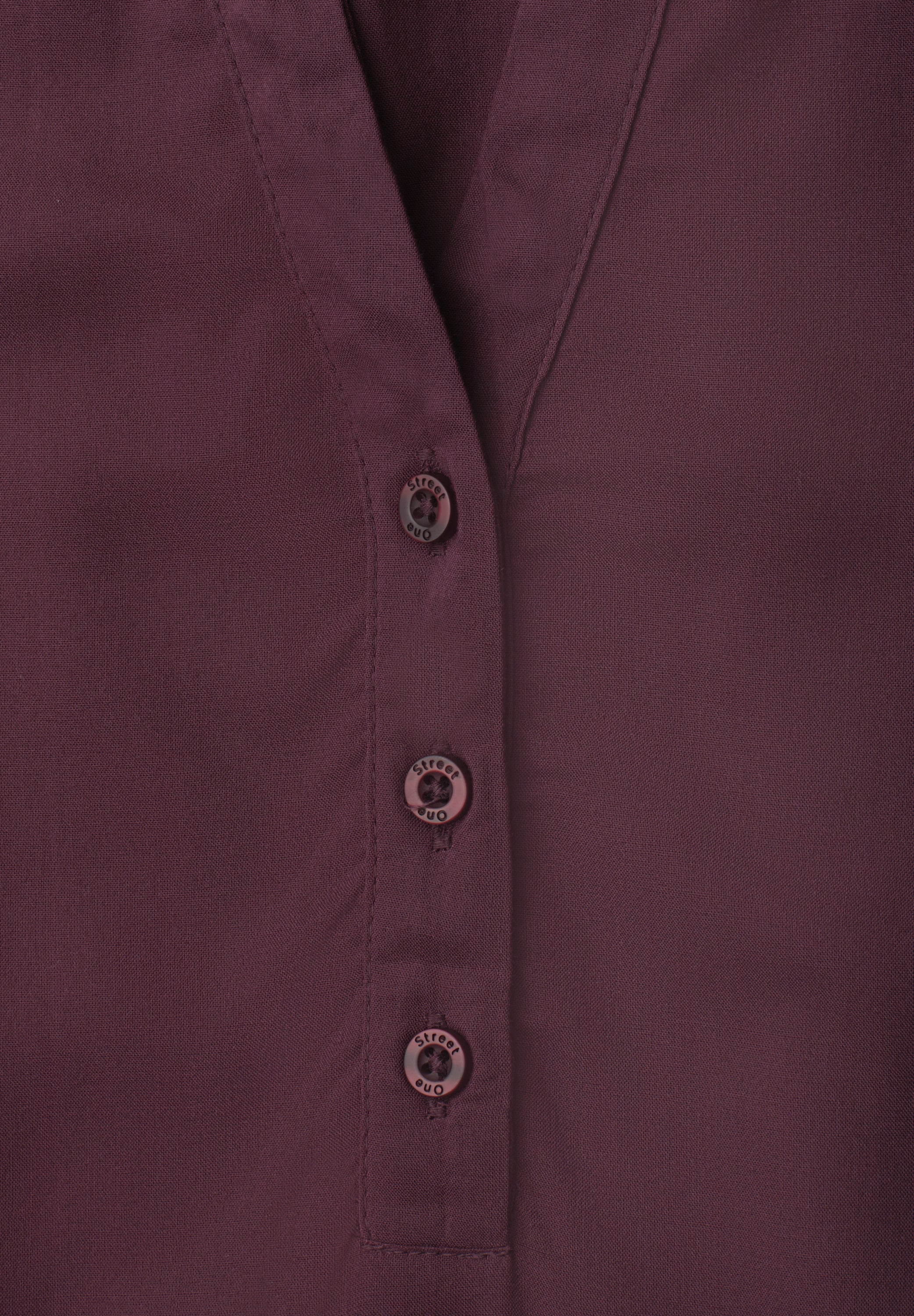 Kurzarm Bluse mit Split Neck und Elastiksaum