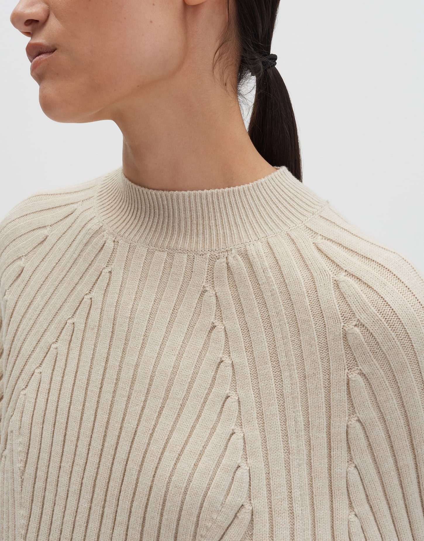Feinstrick Pullover Damen überschnittener Langarm asymmetrische Rippstruktur