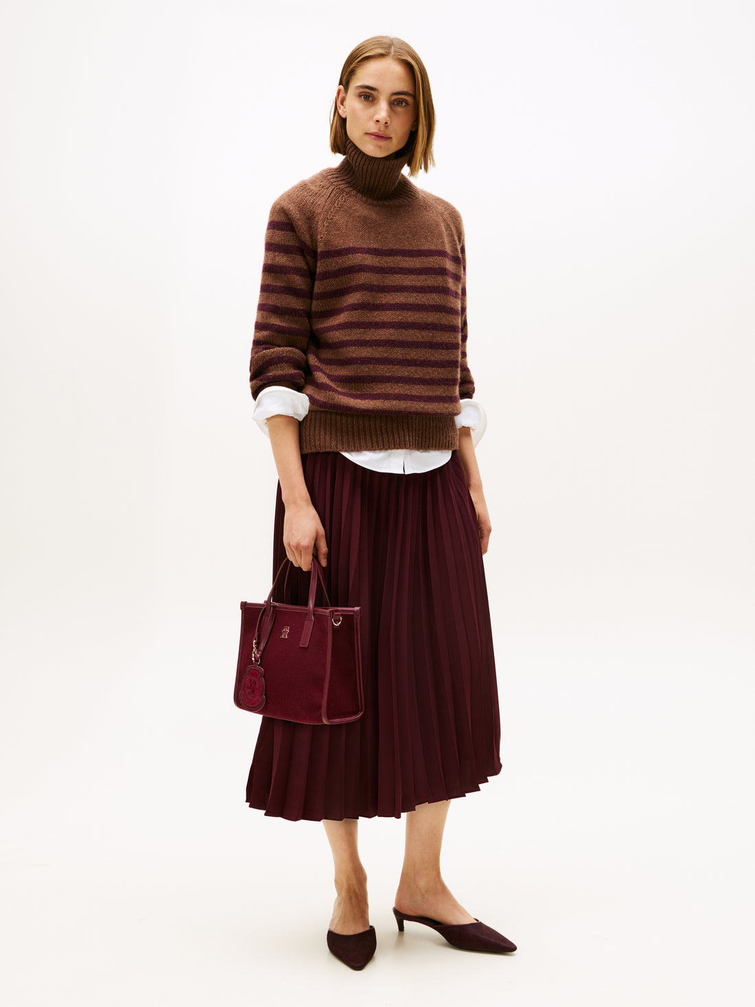 FLUID PLEATED PULL ON MIDI SKIRT