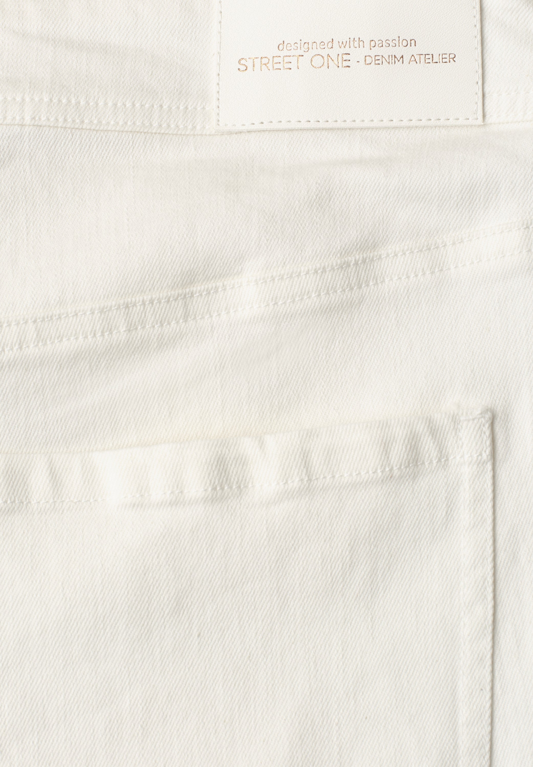 Flared Leg Jeans mit Ziersaum