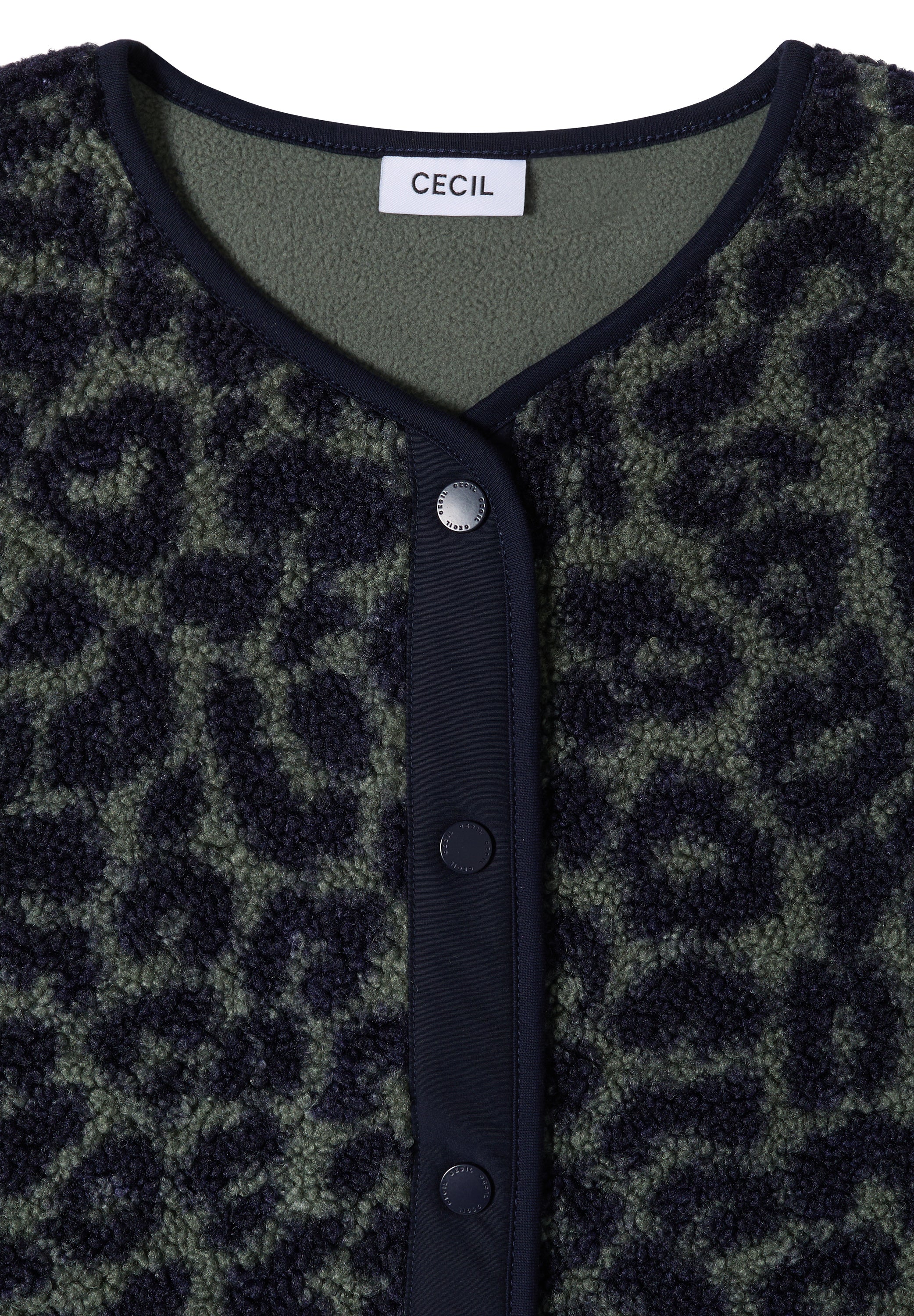 Teddy-Weste mit Softshelldetails und Leo-Muster