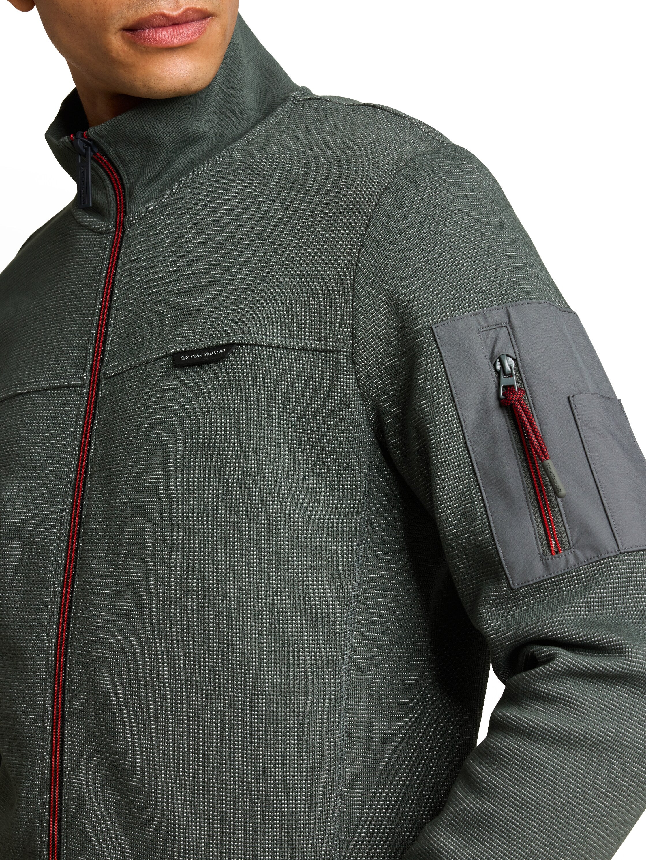 Sweatjacke mit Ärmeltasche